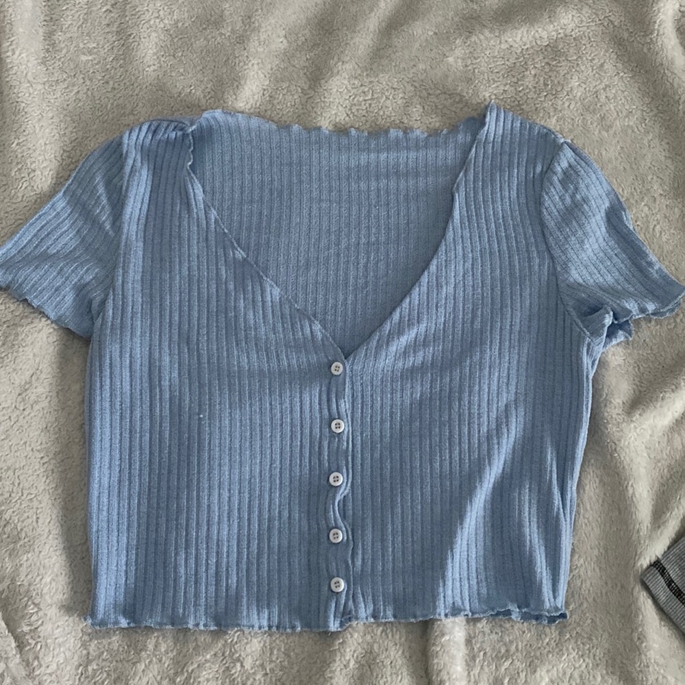 light blue button crop